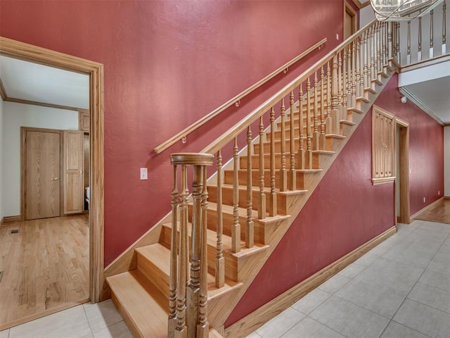 1602 N Davis Ave, Oklahoma City, OK 73127 - staircase featuring tile patterned flooring and crown molding