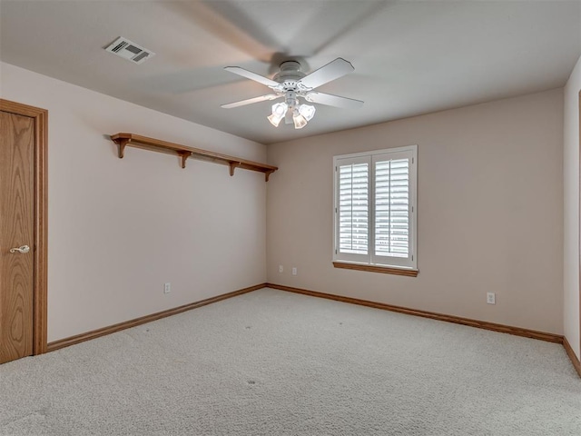 1602 N Davis Ave, Oklahoma City, OK 73127 - spare room featuring ceiling fan and light colored carpet