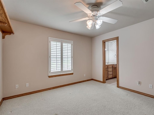 1602 N Davis Ave, Oklahoma City, OK 73127 - unfurnished room featuring light carpet and ceiling fan