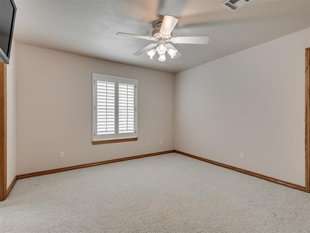 1602 N Davis Ave, Oklahoma City, OK 73127 - empty room featuring carpet flooring and ceiling fan
