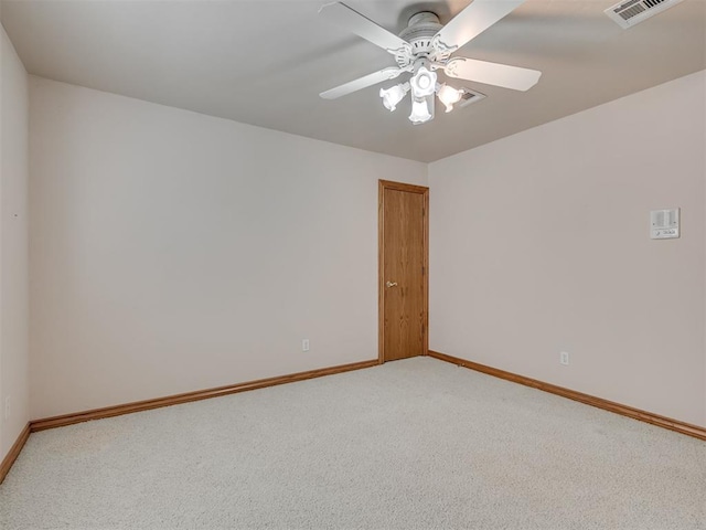 1602 N Davis Ave, Oklahoma City, OK 73127 - unfurnished room featuring light colored carpet and ceiling fan