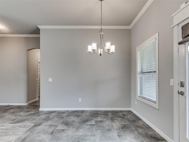 8612 SW 36th Ter, Oklahoma City, OK 73179 - unfurnished dining area with ornamental molding, a chandelier, and arched walkways