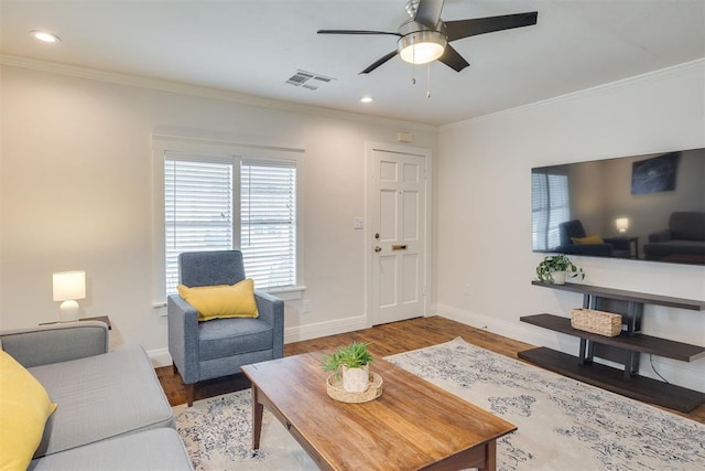 615 NW 26th St, Oklahoma City, OK 73103 - living area featuring ornamental molding, wood finished floors, ceiling fan, and recessed lighting