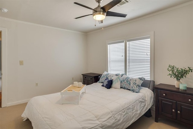 615 NW 26th St, Oklahoma City, OK 73103 - bedroom featuring ornamental molding, light colored carpet, and ceiling fan