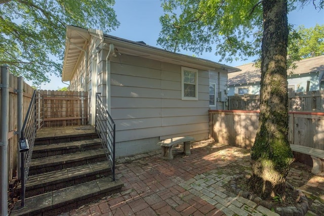 615 NW 26th St, Oklahoma City, OK 73103 - view of property exterior with a patio