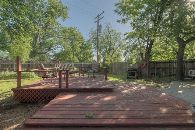 615 NW 26th St, Oklahoma City, OK 73103 - wooden terrace with a fenced backyard