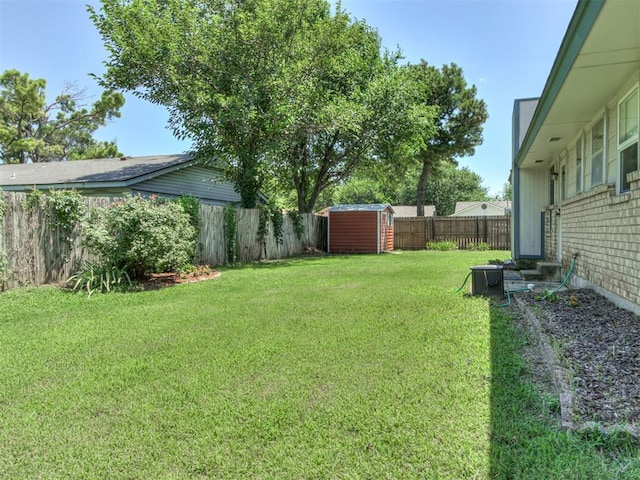 501 E Cardinal Pl, Midwest City, OK 73130 - fenced backyard featuring a shed