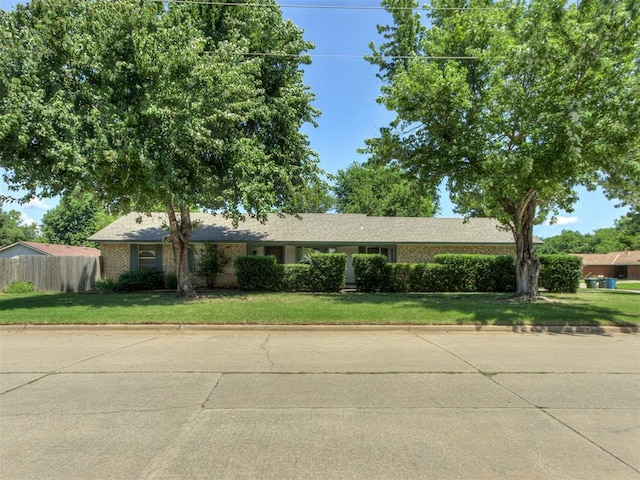 501 E Cardinal Pl, Midwest City, OK 73130 - single story home featuring brick siding
