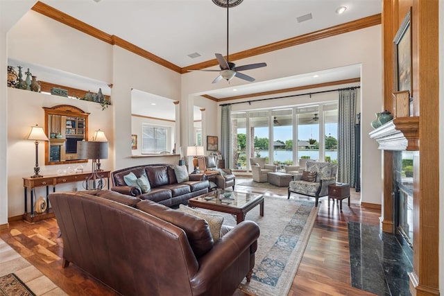8404 NW 65th Pl, Oklahoma City, OK 73132 - living room featuring a ceiling fan, ornamental molding, a fireplace, a water view, and recessed lighting