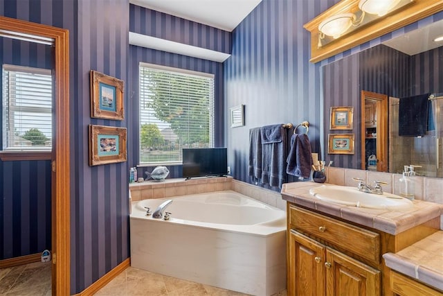 8404 NW 65th Pl, Oklahoma City, OK 73132 - bathroom with wallpapered walls, a garden tub, vanity, healthy amount of natural light, and a shower
