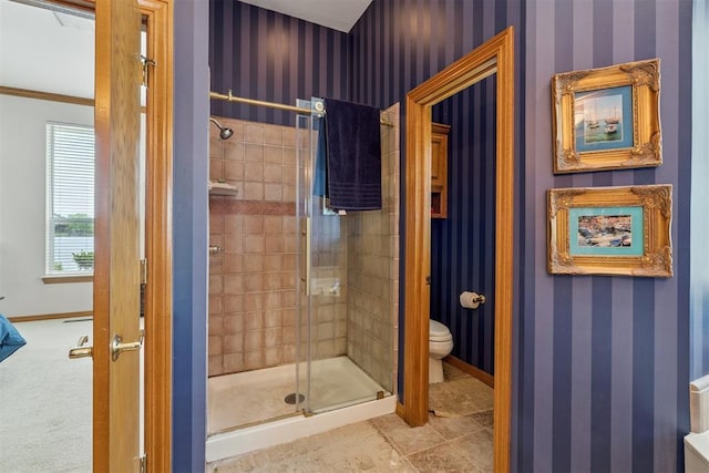 8404 NW 65th Pl, Oklahoma City, OK 73132 - bathroom featuring a stall shower, wallpapered walls, and tile patterned flooring