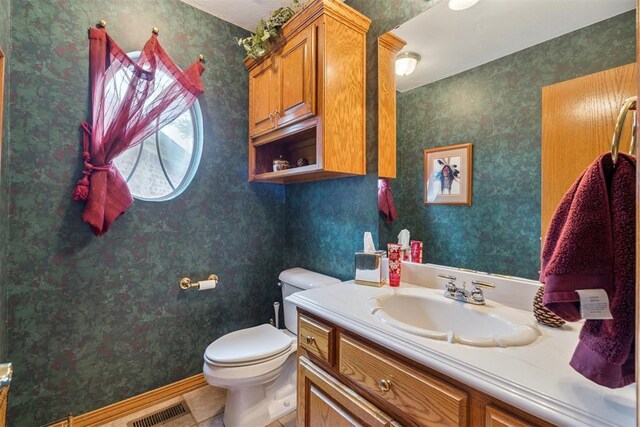 8404 NW 65th Pl, Oklahoma City, OK 73132 - half bathroom with vanity and wallpapered walls