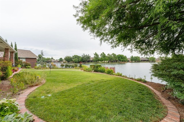 8404 NW 65th Pl, Oklahoma City, OK 73132 - view of green lawn featuring a water view