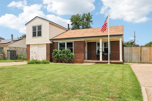 3213 SE 20th St, Del City, OK 73115 - view of front facade with concrete driveway, brick siding, a porch, and a garage