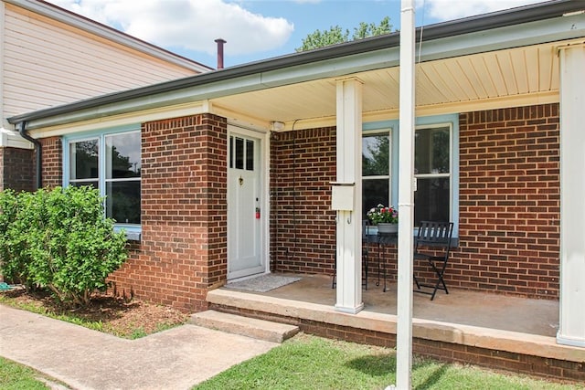 3213 SE 20th St, Del City, OK 73115 - entrance to property with brick siding and covered porch