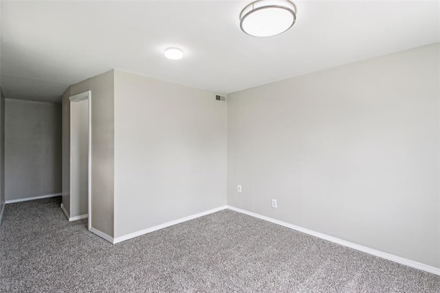 3213 SE 20th St, Del City, OK 73115 - carpeted empty room with baseboards