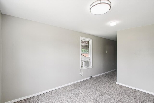 3213 SE 20th St, Del City, OK 73115 - carpeted spare room with baseboards and cooling unit