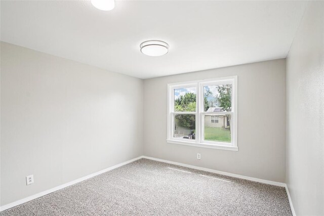 3213 SE 20th St, Del City, OK 73115 - carpeted spare room featuring baseboards