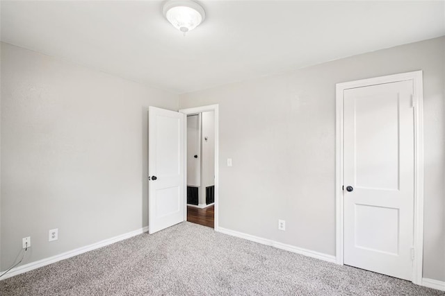 3213 SE 20th St, Del City, OK 73115 - unfurnished bedroom featuring carpet flooring and baseboards