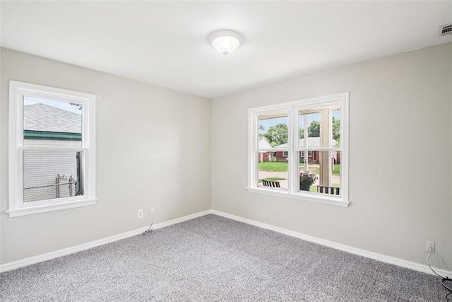 3213 SE 20th St, Del City, OK 73115 - empty room with carpet flooring and baseboards
