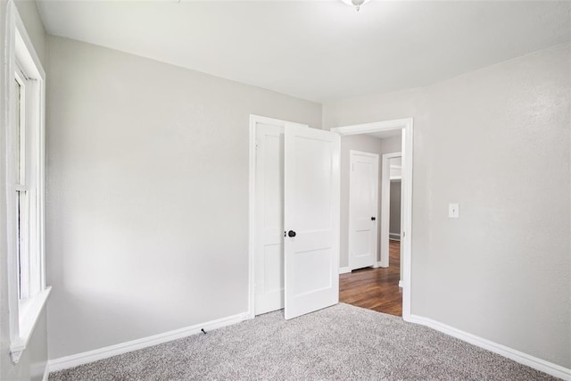 3213 SE 20th St, Del City, OK 73115 - unfurnished bedroom featuring carpet floors and baseboards