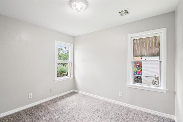 3213 SE 20th St, Del City, OK 73115 - carpeted spare room with baseboards