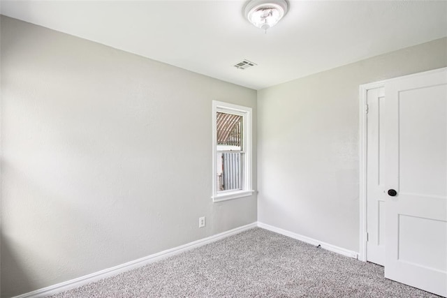 3213 SE 20th St, Del City, OK 73115 - spare room with carpet flooring and baseboards