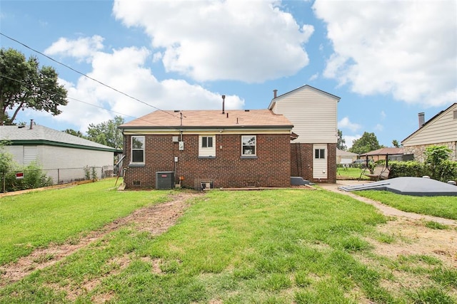 3213 SE 20th St, Del City, OK 73115 - rear view of property featuring brick siding