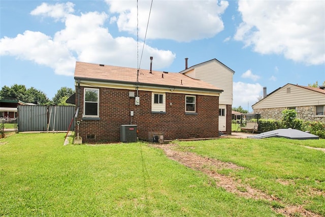 3213 SE 20th St, Del City, OK 73115 - back of property with brick siding, crawl space, and a patio area