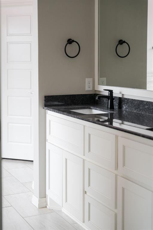 8317 Poplar Dr, Edmond, OK 73034 - bathroom featuring vanity and tile patterned floors