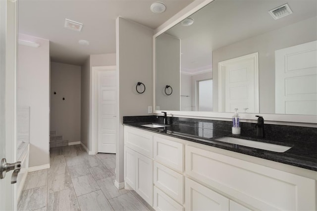 8317 Poplar Dr, Edmond, OK 73034 - full bath with double vanity and marble finish flooring