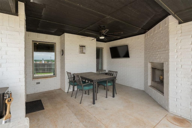 8317 Poplar Dr, Edmond, OK 73034 - view of patio with a ceiling fan and outdoor dining space