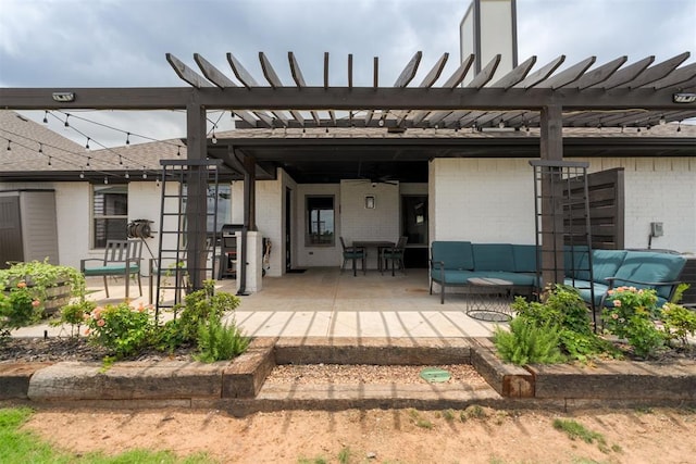 8317 Poplar Dr, Edmond, OK 73034 - back of house featuring outdoor lounge area, brick siding, a pergola, and a patio