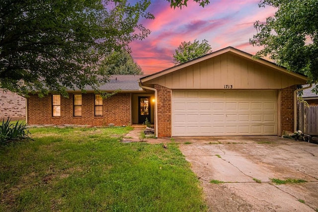 1713 Apian Way, Edmond, OK 73003 - single story home featuring concrete driveway, brick siding, and an attached garage