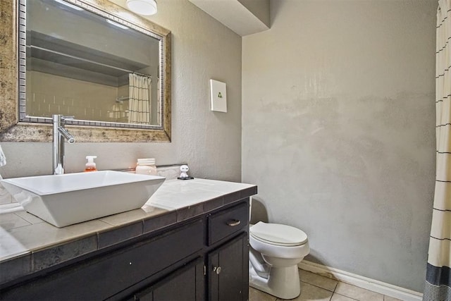 1713 Apian Way, Edmond, OK 73003 - full bath with tile patterned floors, vanity, and a shower with shower curtain
