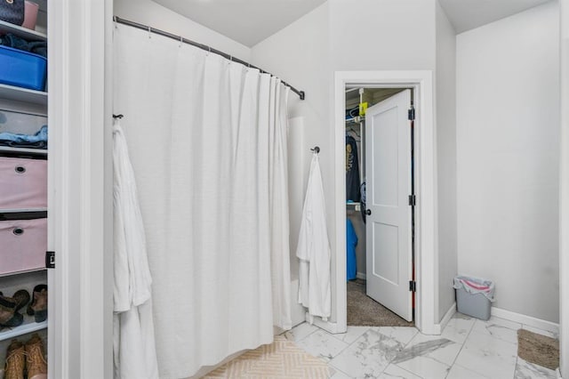 321 SW 147th St, Oklahoma City, OK 73160 - bathroom with marble finish flooring and curtained shower