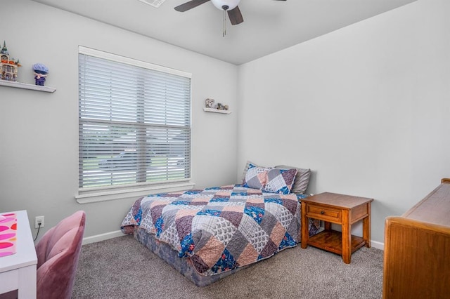 321 SW 147th St, Oklahoma City, OK 73160 - carpeted bedroom with baseboards and a ceiling fan