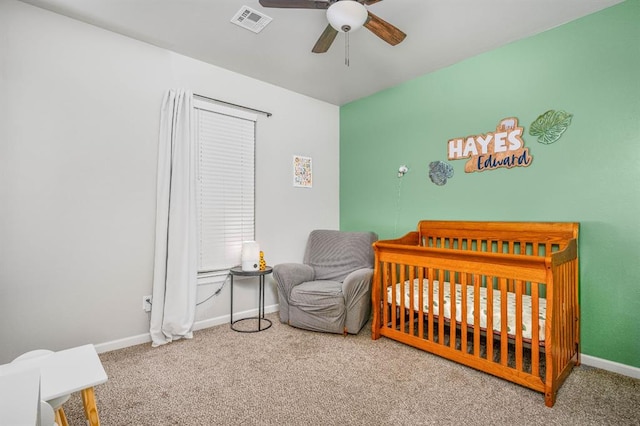 321 SW 147th St, Oklahoma City, OK 73160 - carpeted bedroom with a nursery area and a ceiling fan