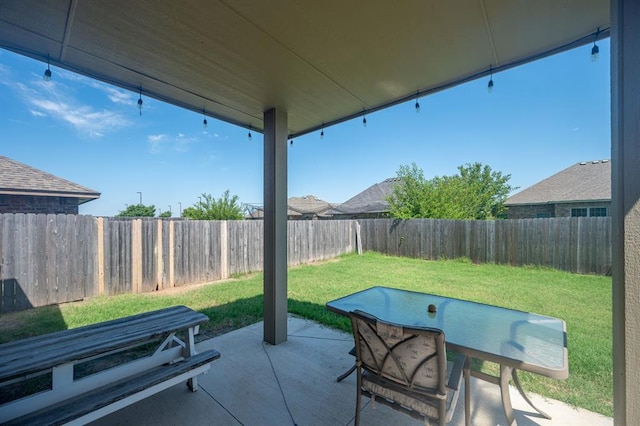 321 SW 147th St, Oklahoma City, OK 73160 - fenced backyard with a patio area and outdoor dining area