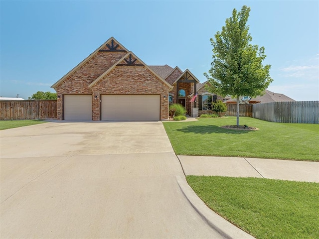 1470 Auburn Cir, Piedmont, OK 73078 - view of front of property featuring concrete driveway, an attached garage, and brick siding