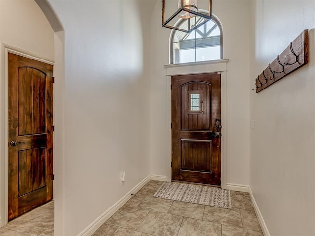 1470 Auburn Cir, Piedmont, OK 73078 - entrance foyer featuring healthy amount of natural light and arched walkways