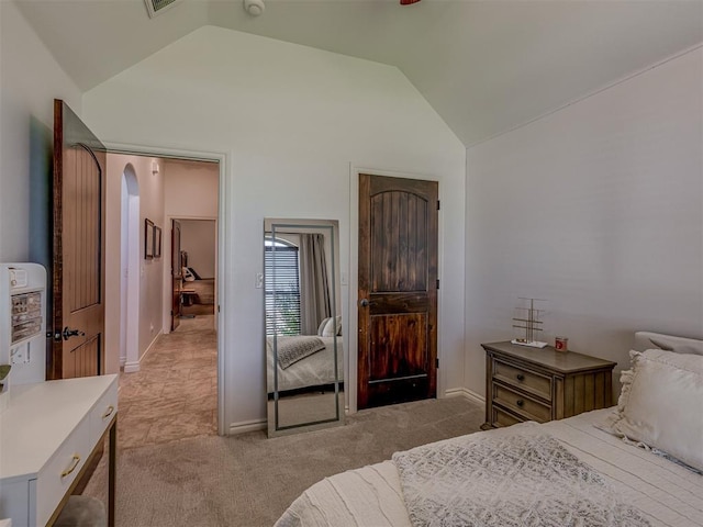 1470 Auburn Cir, Piedmont, OK 73078 - bedroom with vaulted ceiling and light carpet