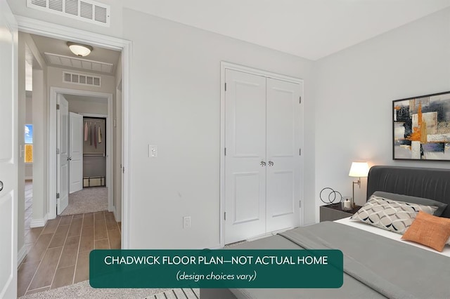 17621 Horne Ln, Edmond, OK 73012 - bedroom featuring a closet and wood tiled floors