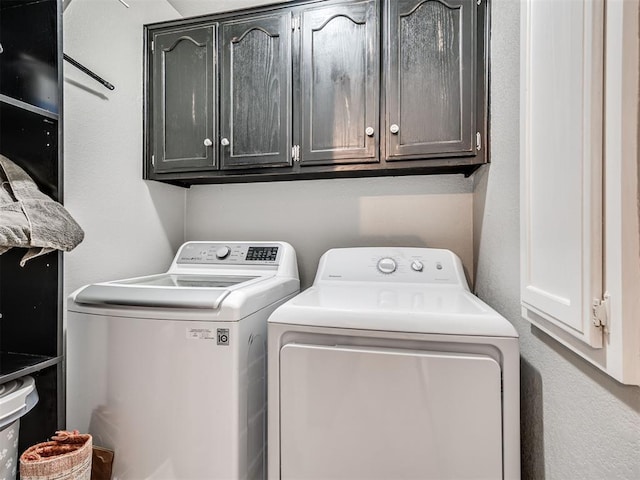 1011 SW 22nd St, Moore, OK 73170 - washroom with washer and dryer and cabinet space