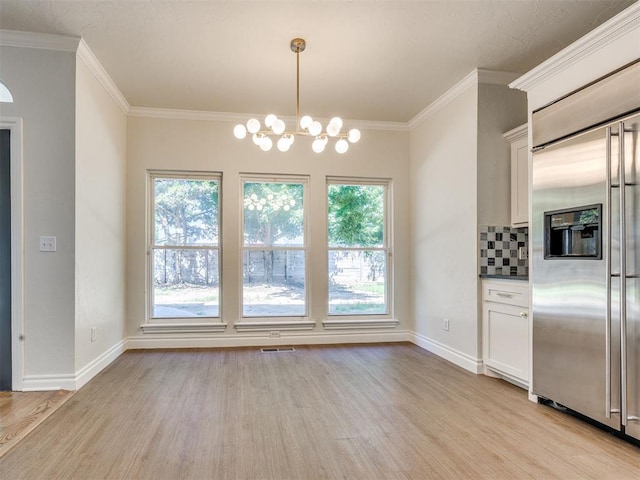 1008 Bentbrook Pl, Norman, OK 73072 - unfurnished dining area with light wood-style flooring, a chandelier, and ornamental molding