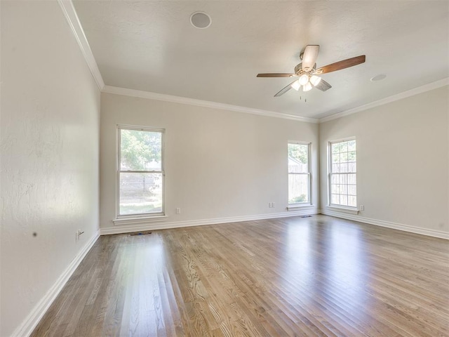 1008 Bentbrook Pl, Norman, OK 73072 - unfurnished room with wood finished floors, a ceiling fan, and ornamental molding