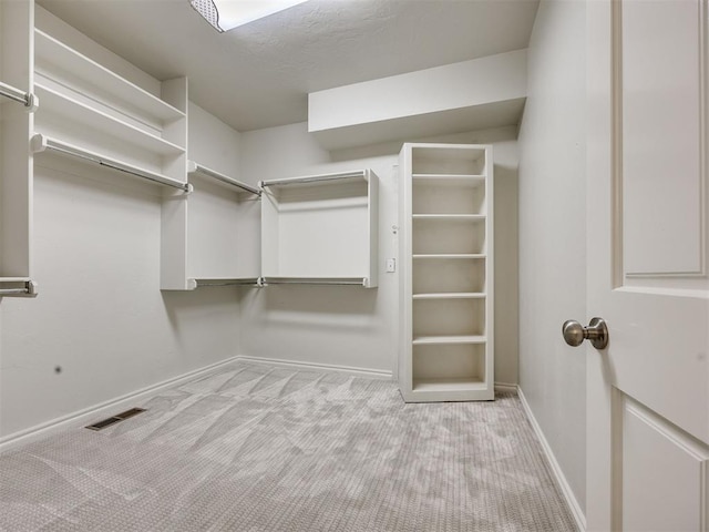 1008 Bentbrook Pl, Norman, OK 73072 - walk in closet featuring carpet flooring