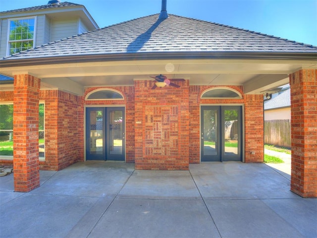 1008 Bentbrook Pl, Norman, OK 73072 - entrance to property featuring french doors, brick siding, a patio, and ceiling fan
