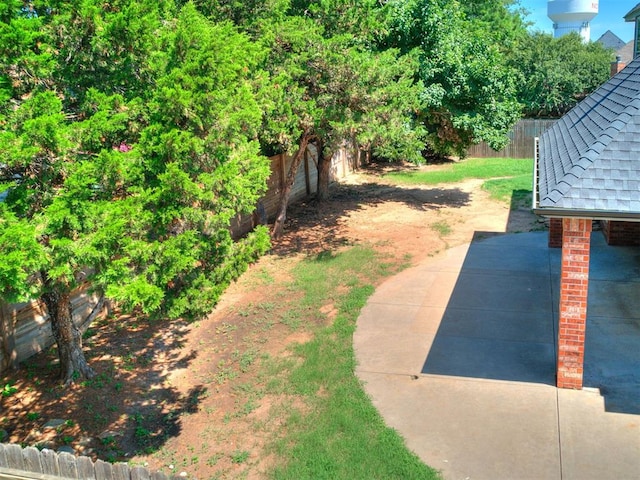 1008 Bentbrook Pl, Norman, OK 73072 - fenced backyard featuring a patio