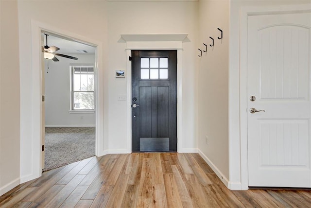 1632 NE 35th St, Moore, OK 73160 - entrance foyer with light wood-style floors, a ceiling fan, and healthy amount of natural light